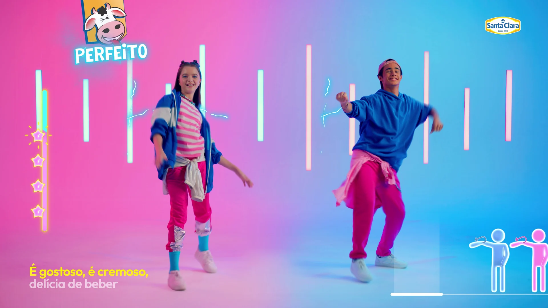 Menina e menino dançam em cenário de degradê rosa e azul com barras de neon, selo Perfeito e avatares de jogo de dança no canto.